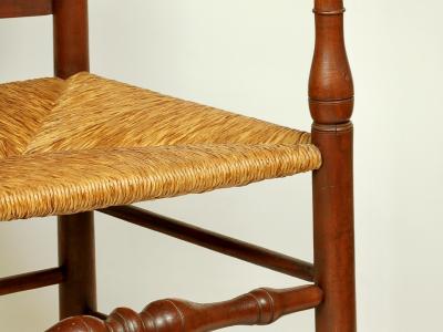 Slat-back armchair detail